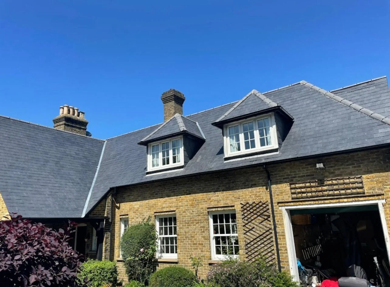 Pristine slate roof and gutters installed by Weathershield Roofing & Home Improvements
